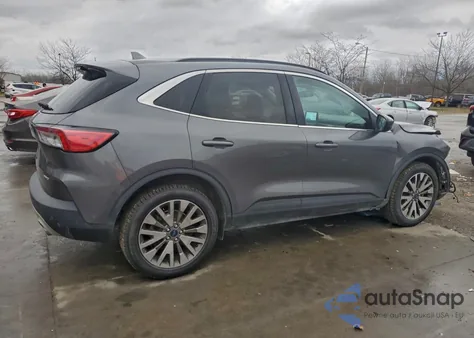 2021 Ford Escape Titanium from USA, damaged, VIN 1FMCU9J96MUB23461